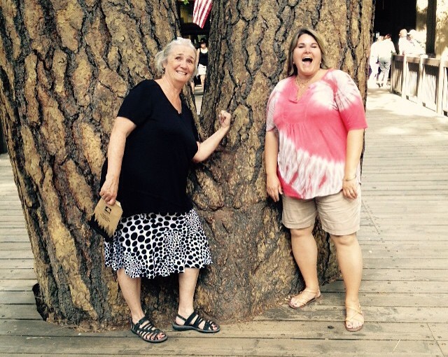 The girls being a little crazy. These are small Giant Sequoia trees at the visitors center.